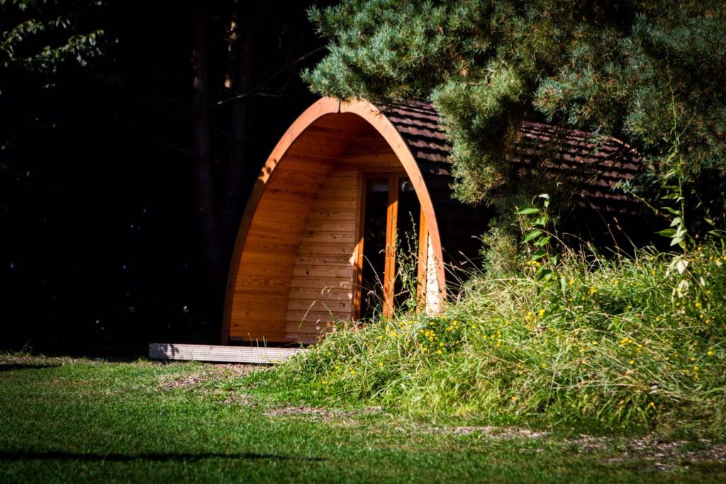 One of our glamping camping pods at our site in Lincolnshire set back into the woodland